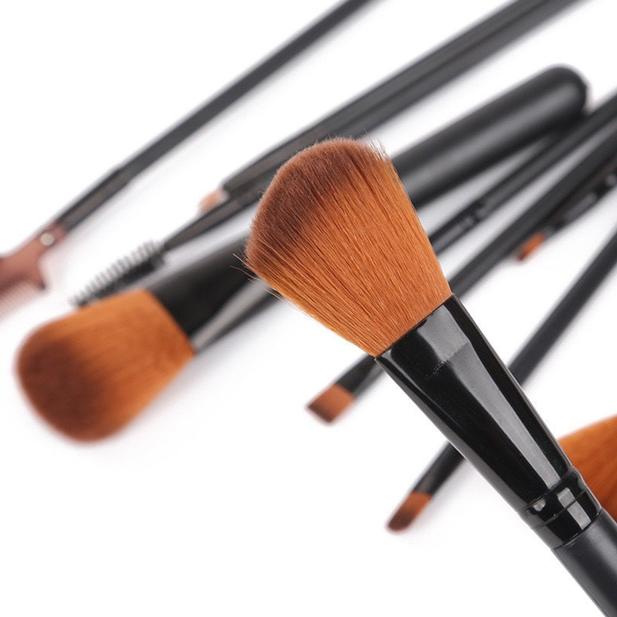 Close-up of black face and eye brushes from the NZ 12-piece makeup brush set