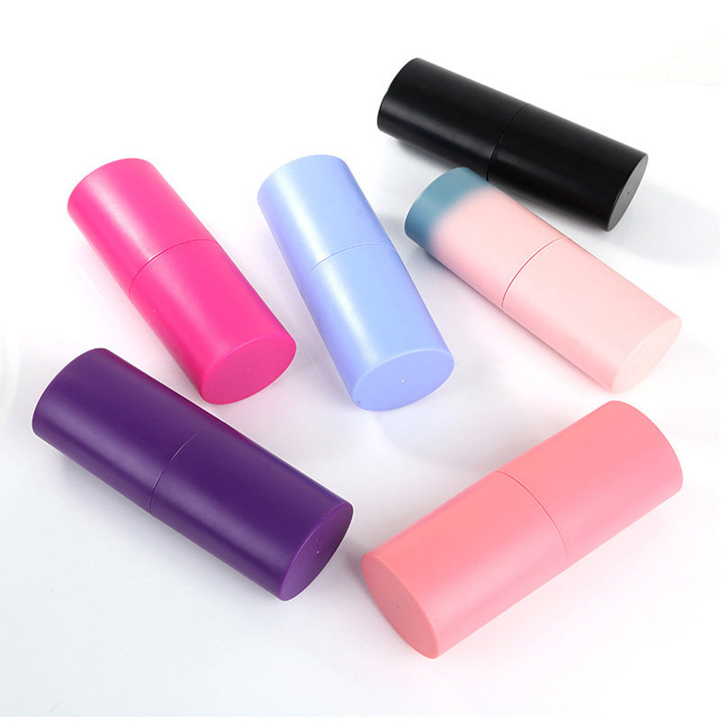 Cylindrical makeup brush cases shown in pink, blue, purple, rose and black
