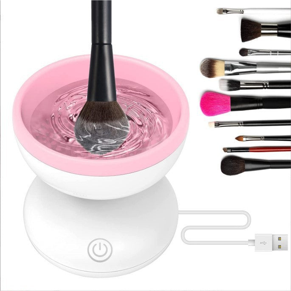 White and pink USB electric cleaner washing a makeup brush in water