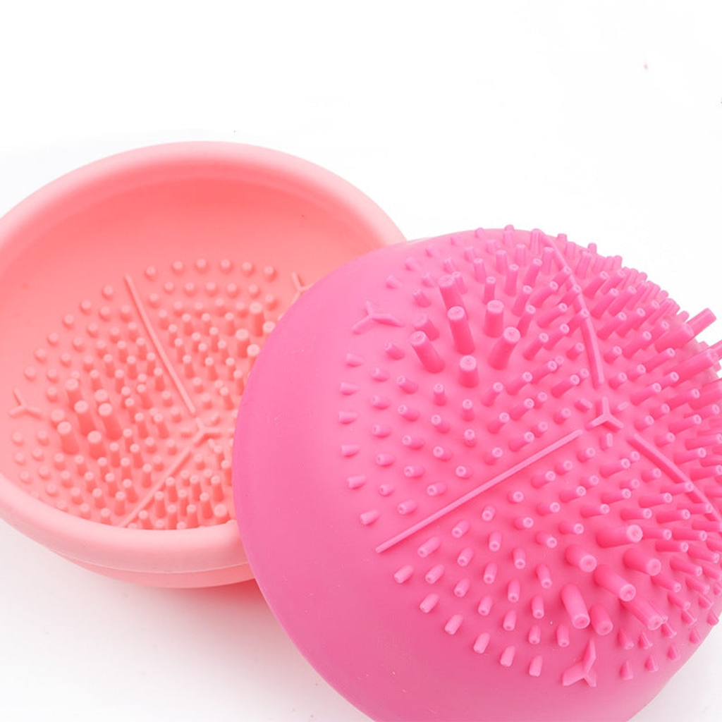 Close-up of the pink textured silicone brush-cleaning bowl