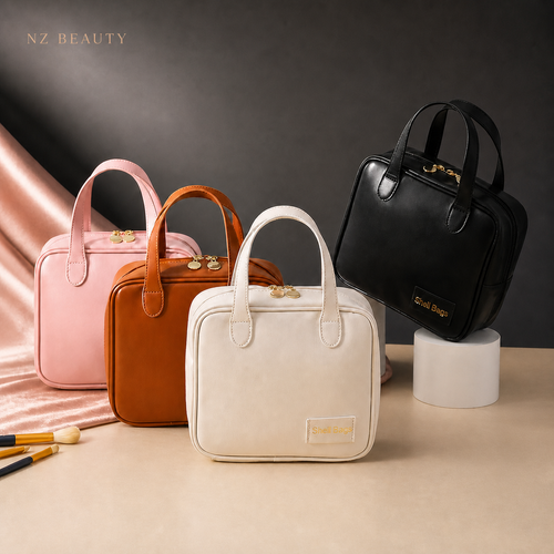 Rose, caramel, ivory and black structured beauty travel pouch color options; colors sold separately